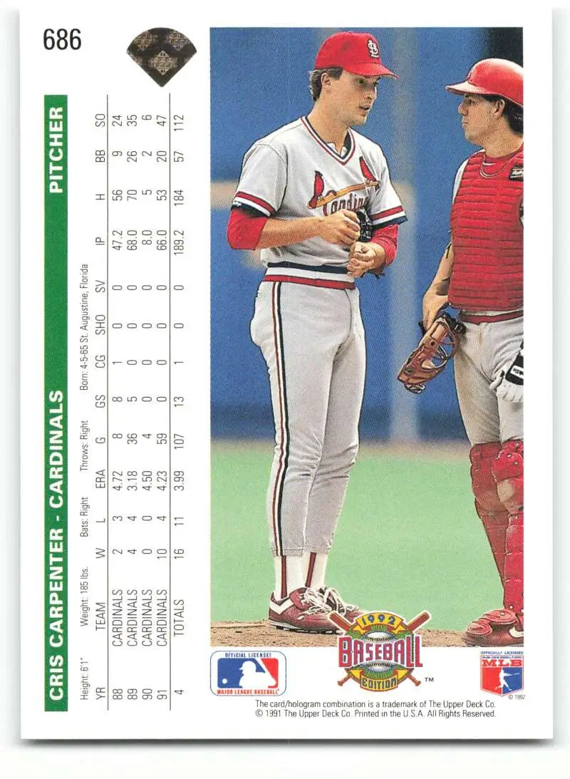 Cris Carpenter and St. Louis Cardinals players converse on field baseball card image