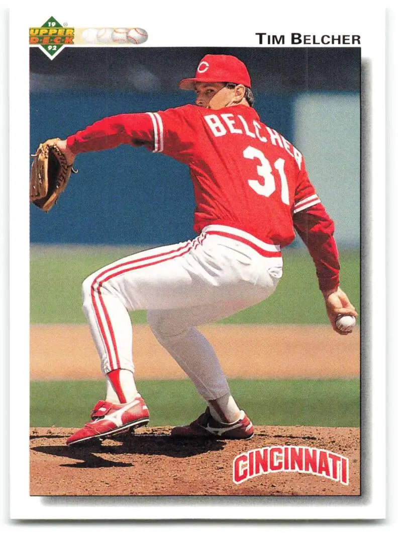 Tim Belcher in red Cincinnati Reds uniform #31 pitching on 1992 baseball card