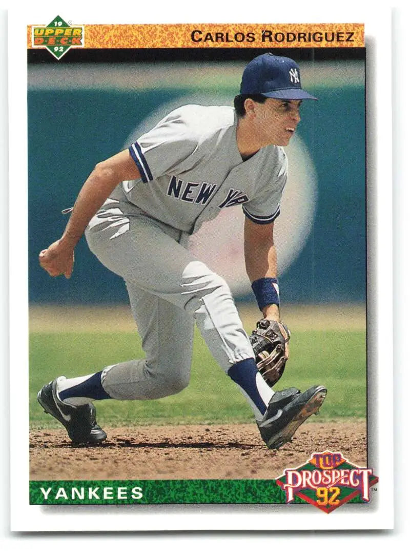 Carlos Rodriguez New York Yankees Baseball Card in fielding stance, gray road uniform
