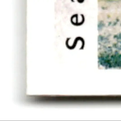 Part of a white paper or card with dark text from 1992 Upper Deck Football Sean Gilbert #424 RC Los Angeles Rams