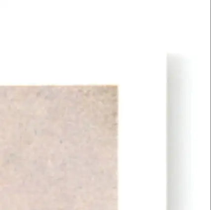 Light beige rectangular tile from 1992 Upper Deck Football Sean Gilbert RC Los Angeles Rams