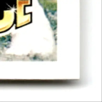 Glossy golden block letter E with black outline from 1992 Upper Deck Football Sean Gilbert card