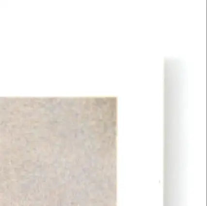 Light-colored rectangular block of wood or stone from Upper Deck Football Sean Gilbert RC