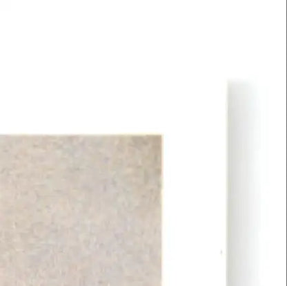 Light-colored rectangular block of wood or stone from Upper Deck Football Sean Gilbert RC