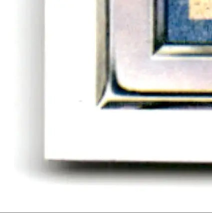 Corner of a silver picture frame with white mat showcasing upper deck football Shane Dronett RC