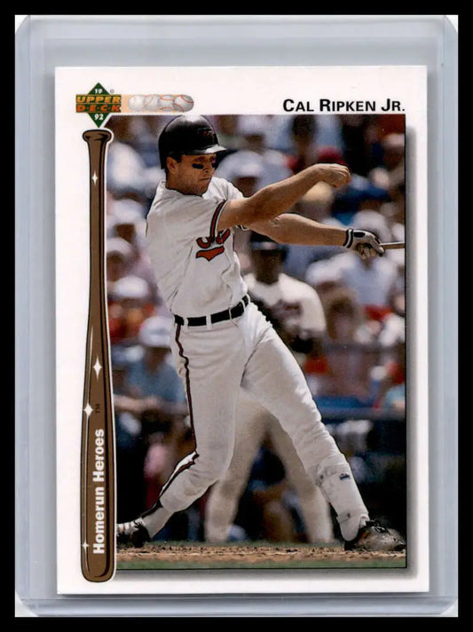 Cal Ripken Jr. mid-swing in a white uniform on a Baltimore Orioles baseball card