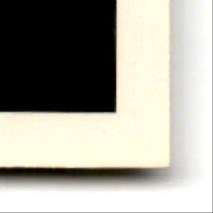 Black corner of 1992 Wild Card Football Steve Young card with light border