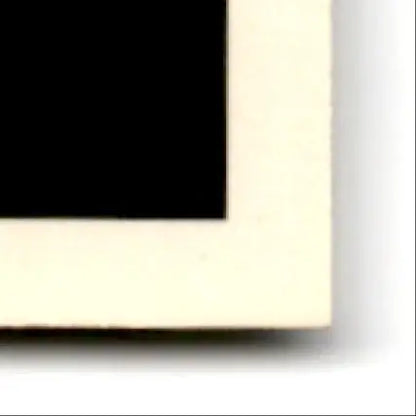 Black corner of 1992 Wild Card Football Steve Young card with light border