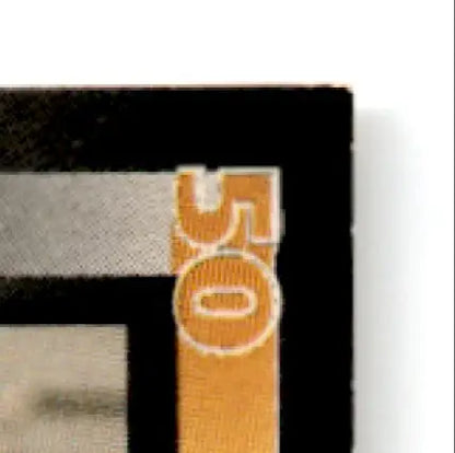 Orange and white 50 on black and gray cover of Wild Card Football Steve Young card