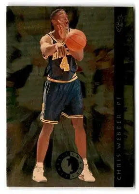 Chris Webber in navy blue and gold uniform shooting ball from Classic Images Four Sport