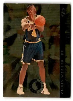 Chris Webber in dark blue uniform preparing to shoot, Classic Images Four Sport