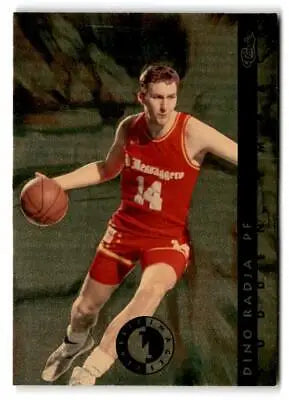 Dino Radja dribbling the ball in a red uniform from Classic Images Four Sport