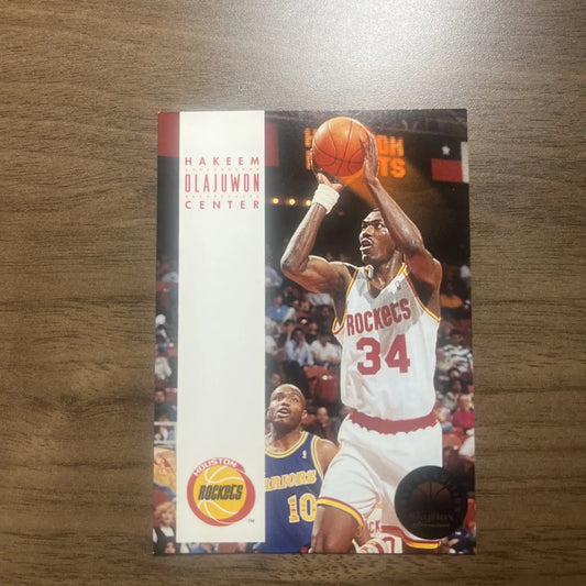 Hakeem Olajuwon basketball card from 1993-94 Skybox Premium NBA series featuring the Houston Rockets