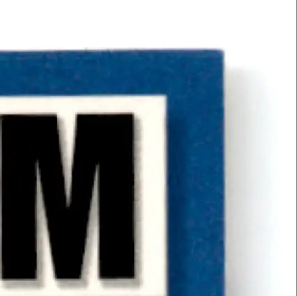 Blue foam letter M sticker with black border for 1993-94 Upper Deck Hockey Brian Bradley