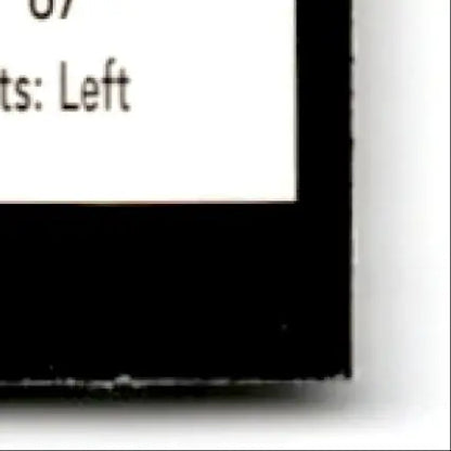 Black Kindle e-reader with white screen and silver accents for 1993-94 Upper Deck Hockey Chris Simon #243 RC