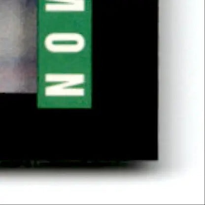 Green rectangular sticker with white now text on black background for 1993-94 Upper Deck Hockey Chris Simon RC