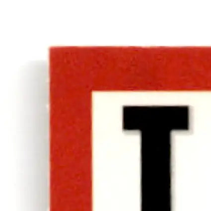 Red and white textured fabric bookmark with black T design for Upper Deck Hockey Claude Lemieux