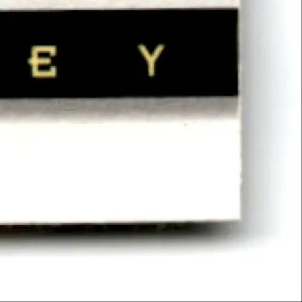 Black and gold keyboard keys with white spacebar, related to Upper Deck Hockey Craig Janney #225b