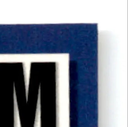 Navy blue textured fabric wall art with white border and black M for Upper Deck Hockey Craig Janney