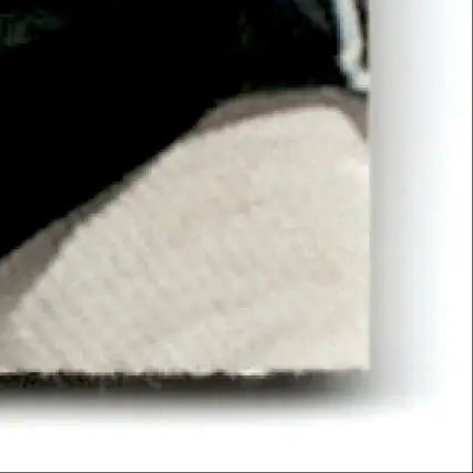 White textured fabric pillow with black piping and zipper for Upper Deck Hockey Luc Robitaille