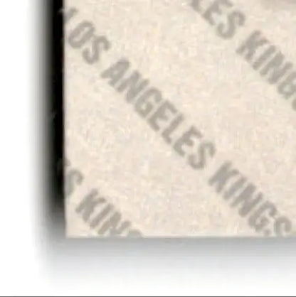 Upper Deck Hockey puck featuring Luc Robitaille Los Angeles Kings 1993-94 card