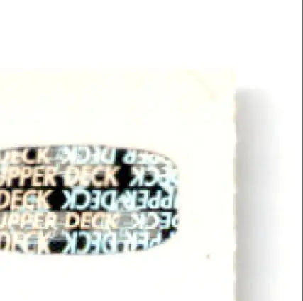 Black and gold Upper Deck hockey puck featuring Hockey Steve Junker New York Islanders