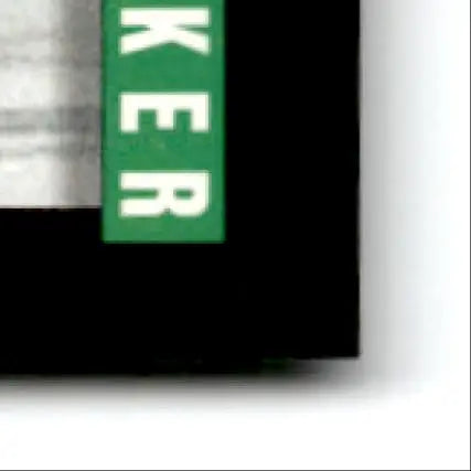 Green rectangular sticker with white ker text on black background for 1993-94 Upper Deck Hockey Steve Junker RC
