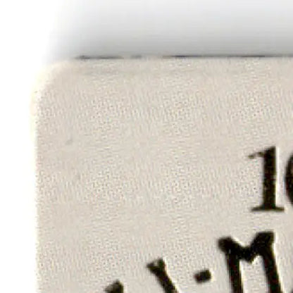 Cream-colored fabric with subtle texture for Los Angeles Raiders action packed football merchandise