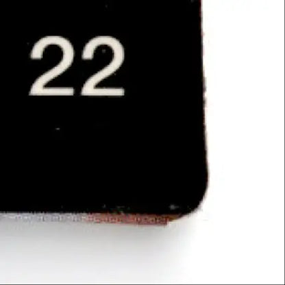 Black rectangular object with rounded corner from 1993 Action Packed Football Jeff George Colts