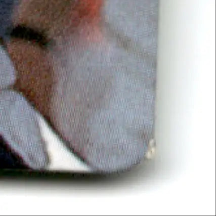 Rounded corner of matte-finish fabric mousepad featuring action packed football Jeff George Colts