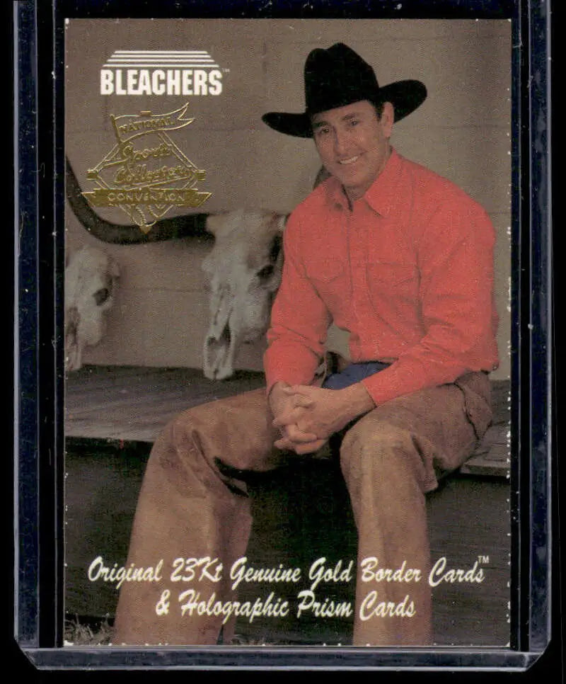 Nolan Ryan baseball card showcasing a person in black cowboy hat and coral western clothing