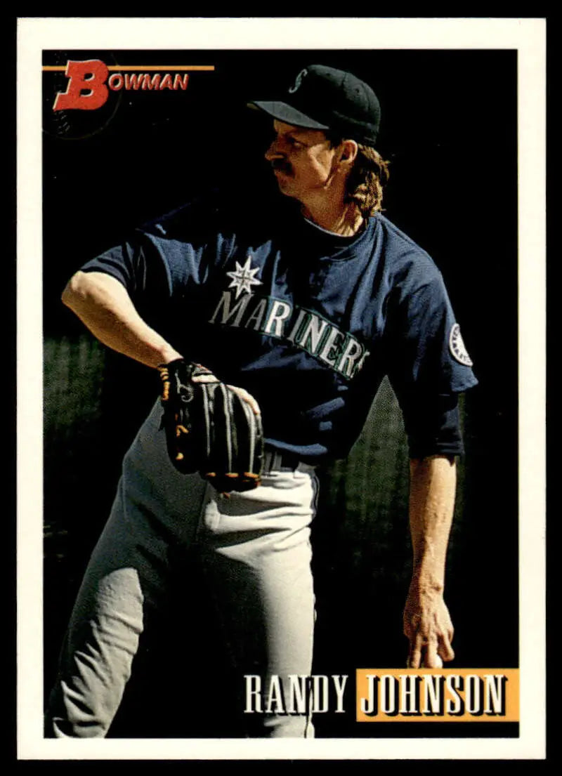 Randy Johnson in pitching stance wearing Seattle Mariners uniform on baseball card