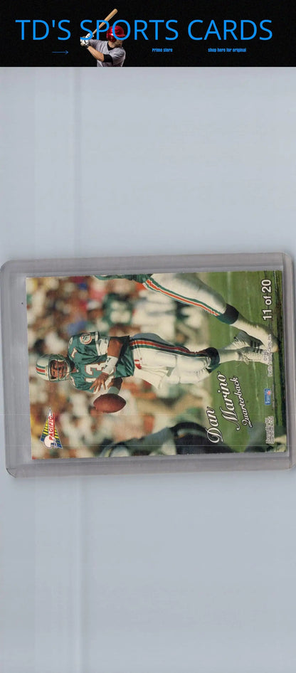 Dan Marino football trading card from Pacific Prisms 1993 featuring player in white and aqua uniform