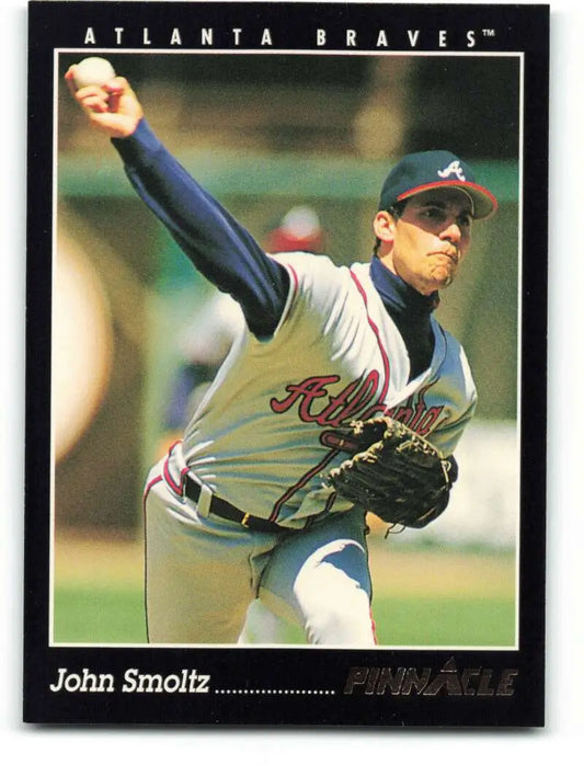 Baseball card of John Smoltz in mid-throwing motion for Atlanta Braves collectors
