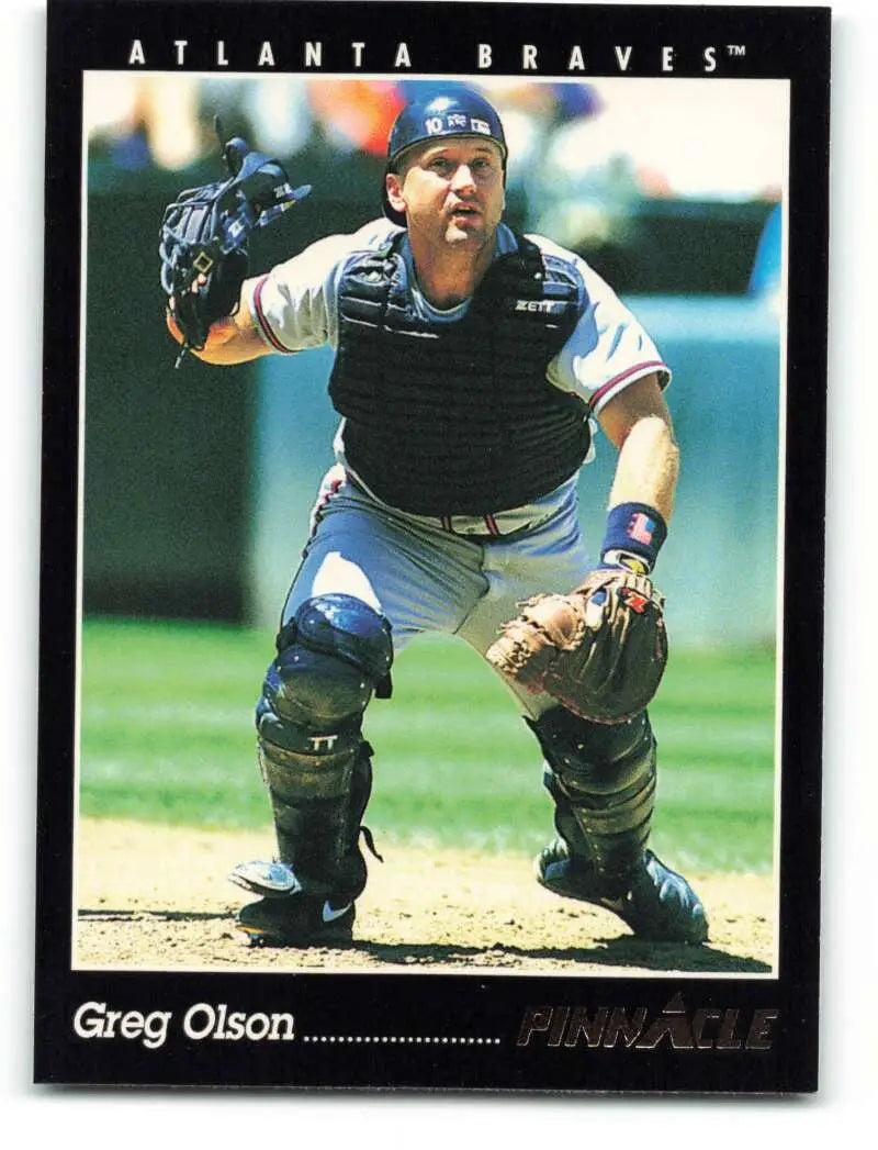 Greg Olson in Atlanta Braves uniform crouching for defensive play on baseball card