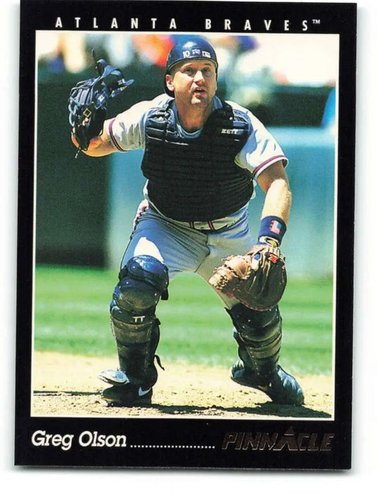 Greg Olson in Atlanta Braves uniform crouching for defensive play on baseball card
