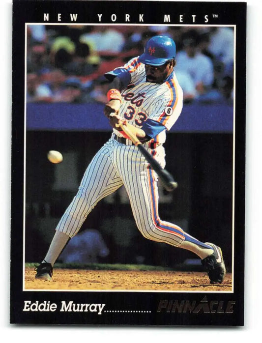 Baseball player in New York Mets uniform swinging bat on Eddie Murray baseball card