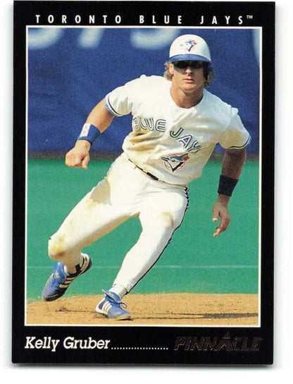 Toronto Blue Jays player Kelly Gruber running the bases in white uniform