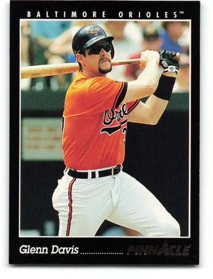 Baseball card of Glenn Davis in orange jersey for Baltimore Orioles at bat