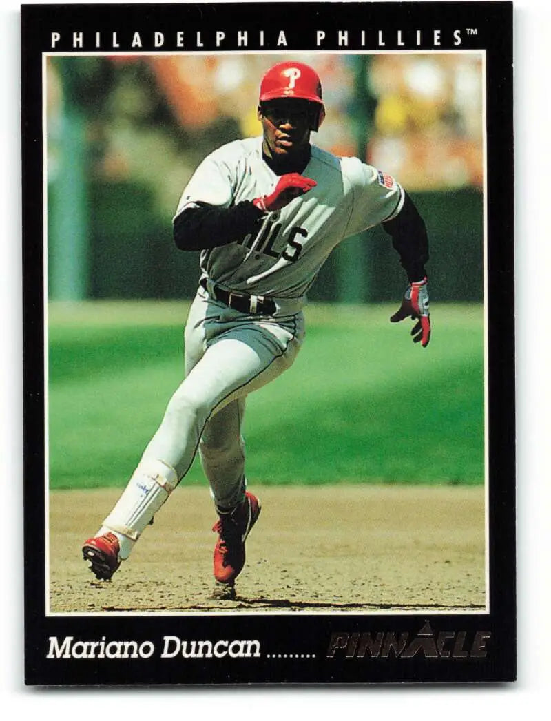 Philadelphia Phillies baseball player Mariano Duncan running in white and red uniform