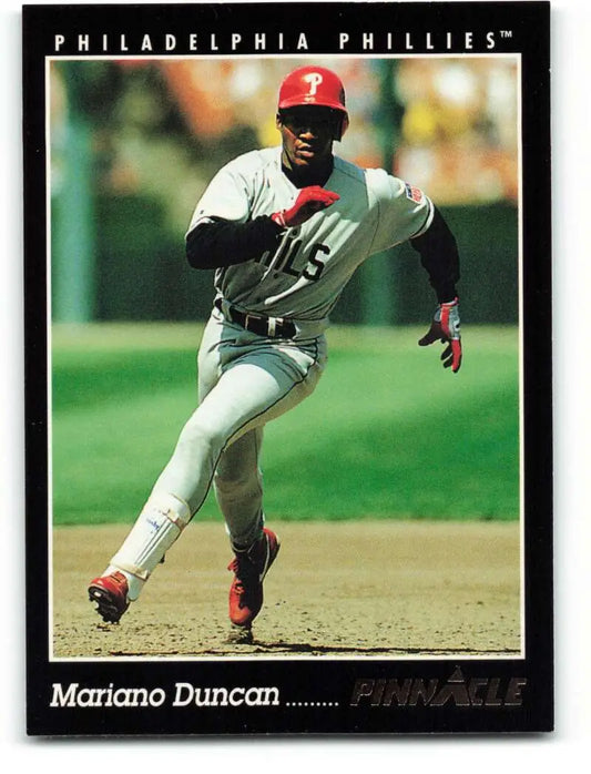 Philadelphia Phillies baseball player Mariano Duncan running in white and red uniform