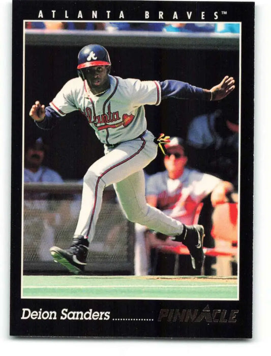 Deion Sanders running on the field in a 1993 Pinnacle Atlanta Braves baseball card