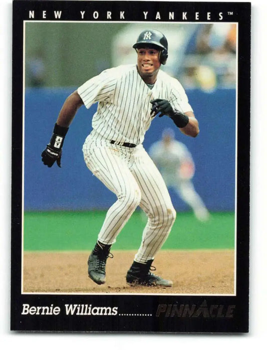 Baseball player in New York Yankees pinstripe uniform running on field for Bernie Williams card