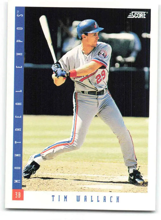 Montreal Expos baseball card featuring Tim Wallach at bat in road gray uniform