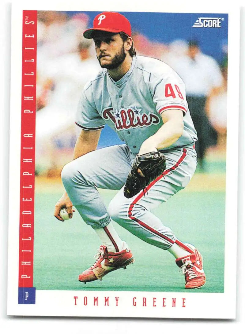 Baseball player in Philadelphia Phillies uniform fielding on 1993 Tommy Greene card
