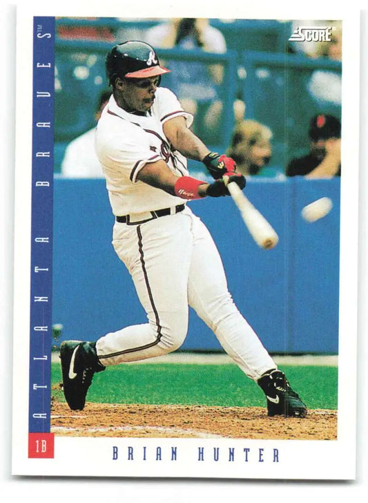 Baseball card of Brian Hunter in Atlanta Braves uniform swinging bat