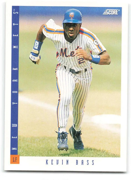 Baseball card of Kevin Bass in pinstriped New York Mets uniform running on field
