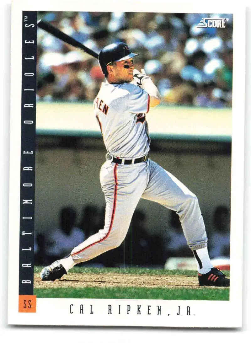 Cal Ripken Jr. swinging a bat in Baltimore Orioles uniform for a baseball card