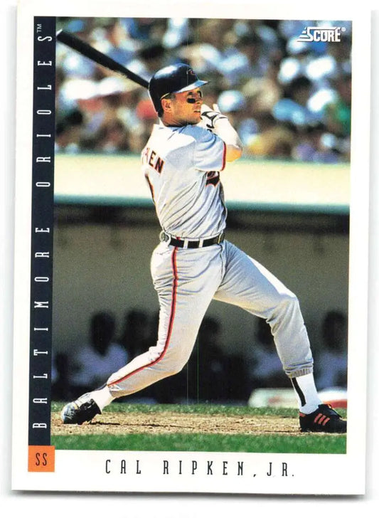 Cal Ripken Jr. swinging a bat in Baltimore Orioles uniform for a baseball card
