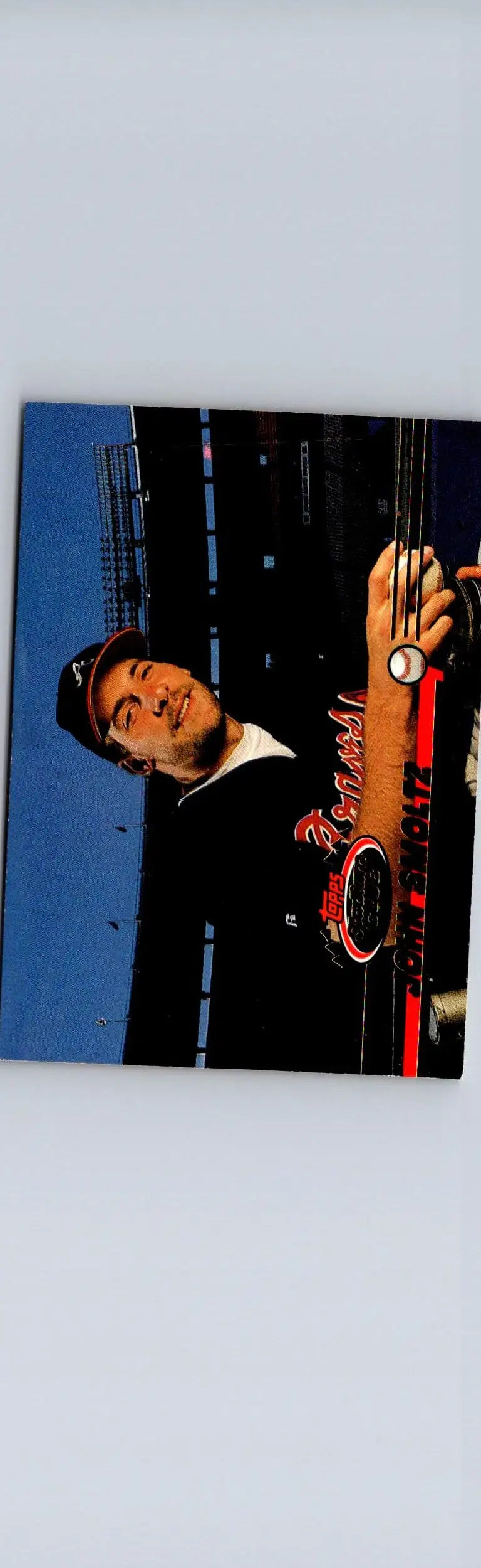 Baseball trading card featuring John Smoltz in black and red Stadium Club uniform